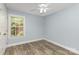 Clean and simple bedroom with a ceiling fan and natural light at 3004 Point Clear Dr, Tega Cay, SC 29708