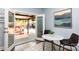 Breakfast nook with marble top table, views of the outdoor patio, and hardwood floors at 3004 Point Clear Dr, Tega Cay, SC 29708