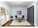 Bright dining area with french doors, marble-top table, and geometric rug at 3004 Point Clear Dr, Tega Cay, SC 29708