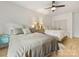 Bright bedroom featuring two beds, wood floors, and natural light at 3505 Trent St, Charlotte, NC 28209