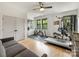Bright room featuring exercise equipment, hardwood floors, and natural light at 3505 Trent St, Charlotte, NC 28209