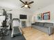 Bright room featuring exercise equipment, hardwood floors, and natural light at 3505 Trent St, Charlotte, NC 28209
