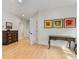 Hallway features hardwood floors, artwork, and a decorative table at 3505 Trent St, Charlotte, NC 28209