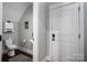 Cozy half bathroom with dark hardwood flooring and standard toilet and sink features at 413 Nobles Way, Belmont, NC 28012