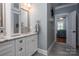 Bathroom featuring granite countertops, neutral wall colors and tile floors with a view to the main bedroom at 413 Nobles Way, Belmont, NC 28012