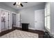 Bedroom featuring white trim and doors, with grey wall paint and a decorative rug at 413 Nobles Way, Belmont, NC 28012