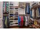 Spacious walk-in closet with ample shelving, hanging rods, and shoe storage, perfect for organization at 413 Nobles Way, Belmont, NC 28012