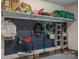 Organized garage with slatwall and shelving, providing ample storage solutions at 413 Nobles Way, Belmont, NC 28012