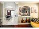 Open-concept dining area with marble floors, seamlessly connecting to the kitchen at 4825 Samuel Richard St, Kannapolis, NC 28083