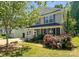 Charming two-story home with a welcoming front porch and well-maintained landscaping at 4825 Samuel Richard St, Kannapolis, NC 28083