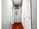 Hallway featuring wood floors, closet and access to the electrical panel at 4825 Samuel Richard St, Kannapolis, NC 28083