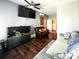 Bright living room includes a large aquarium and comfortable seating, perfect for relaxation at 4825 Samuel Richard St, Kannapolis, NC 28083