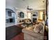 Elegant living room with fireplace, stylish furnishings, and hardwood floors at 4825 Samuel Richard St, Kannapolis, NC 28083