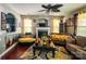 Elegant living room with fireplace, stylish furnishings, and hardwood floors at 4825 Samuel Richard St, Kannapolis, NC 28083
