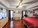 Comfortable main bedroom features tray ceilings, wood floors, and abundant natural light at 4825 Samuel Richard St, Kannapolis, NC 28083