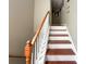 Staircase with wood treads and white risers, leading to the upper level at 4825 Samuel Richard St, Kannapolis, NC 28083