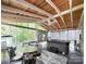 Relaxing sunroom with wood ceiling, screened windows, and hot tub at 4825 Samuel Richard St, Kannapolis, NC 28083