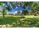 Large backyard with storage shed offering ample space for outdoor activities and storage at 495&501 Turnersburg Hwy, Statesville, NC 28625