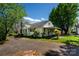 Charming single-story home featuring a covered porch and well-maintained landscaping at 495&501 Turnersburg Hwy, Statesville, NC 28625
