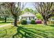 Charming home with a welcoming front porch and meticulously landscaped front yard at 495&501 Turnersburg Hwy, Statesville, NC 28625