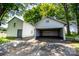 Detached garage and outbuilding providing ample parking and storage space at 495&501 Turnersburg Hwy, Statesville, NC 28625