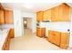 Open kitchen features wood cabinets, an oven, and plenty of natural light at 495&501 Turnersburg Hwy, Statesville, NC 28625