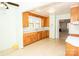 Functional kitchen with wooden cabinets and vintage-style flooring at 495&501 Turnersburg Hwy, Statesville, NC 28625
