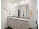 Bathroom featuring granite countertops, double sinks, and light fixtures at 5058 Antebellum Dr, Iron Station, NC 28080