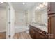Clean bathroom featuring updated fixtures and a sleek design at 5210 Valley Stream Rd, Charlotte, NC 28209