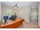 Office with desk, carpeted flooring, and a view of the neighborhood at 5210 Valley Stream Rd, Charlotte, NC 28209