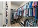 Well-organized walk-in closet with ample storage space for clothes and shoes at 5210 Valley Stream Rd, Charlotte, NC 28209