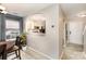 Dining area with a view of the kitchen and entryway, showcasing the home's layout at 5257 Glenlea Walk Ln, Charlotte, NC 28216