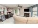 Comfortable living room featuring a fireplace and a view into an adjacent office space at 5257 Glenlea Walk Ln, Charlotte, NC 28216