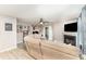 Inviting living room with a fireplace, ceiling fan, and sliding glass doors to the exterior at 5257 Glenlea Walk Ln, Charlotte, NC 28216