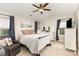 The main bedroom has a ceiling fan and generous natural light at 5257 Glenlea Walk Ln, Charlotte, NC 28216