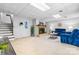 Large finished basement featuring a cozy seating area with a fireplace and staircase to the upper level at 5486 Suttlemyre Ln, Hickory, NC 28601