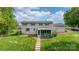 Spacious two story home with grey shutters, a screened in porch and a landscaped yard at 5486 Suttlemyre Ln, Hickory, NC 28601