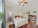 Comfortable bedroom with an oriental rug, decorative pillows, and natural light at 6312 Kennard Dr, Charlotte, NC 28216