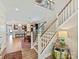 Grand foyer featuring staircase, dining area, and open access to the kitchen at 6312 Kennard Dr, Charlotte, NC 28216