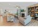 Inviting living room with a fireplace, built-in bookshelves, and comfortable seating at 6312 Kennard Dr, Charlotte, NC 28216