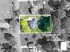 Aerial view of the property showcasing lot lines and surrounding greenery in a residential area at 695 Linwood Rd, Mooresville, NC 28115