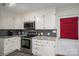 Well-equipped kitchen featuring stainless steel appliances, granite countertops, and ample cabinet space, great for cooking at 695 Linwood Rd, Mooresville, NC 28115