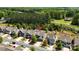 Aerial view of homes featuring neat landscaping, manicured lawns and street parking at 7039 Chrysanthemum Rd, Lancaster, SC 29720
