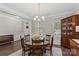 Bright dining room featuring a round table, dark hardwood floors, and natural light at 7039 Chrysanthemum Rd, Lancaster, SC 29720