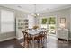 Dining area features a sliding glass door leading to the backyard patio at 7039 Chrysanthemum Rd, Lancaster, SC 29720
