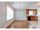 Charming eat in kitchen featuring tile and wood floors at 704 E Catawba St, Belmont, NC 28012