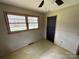 Bedroom with a window providing natural light and a ceiling fan at 785 Nc Highway 109 N Hwy, Troy, NC 27371