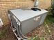 Outdoor HVAC unit next to a brick wall at 785 Nc Highway 109 N Hwy, Troy, NC 27371