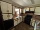 Kitchen featuring white cabinets and an oven at 785 Nc Highway 109 N Hwy, Troy, NC 27371