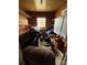 A cluttered storage area with shelving and packed boxes, needing organization at 785 Nc Highway 109 N Hwy, Troy, NC 27371